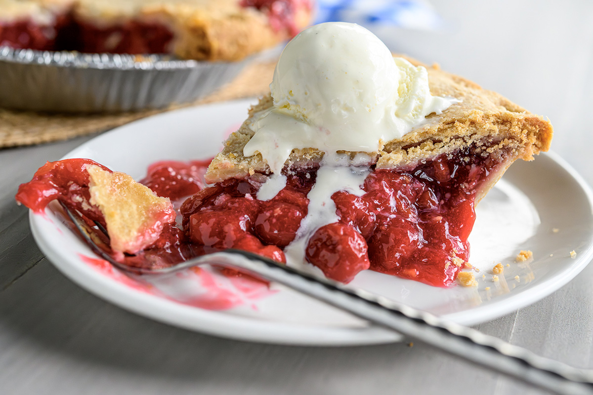 Cherry pie slice with ice cream